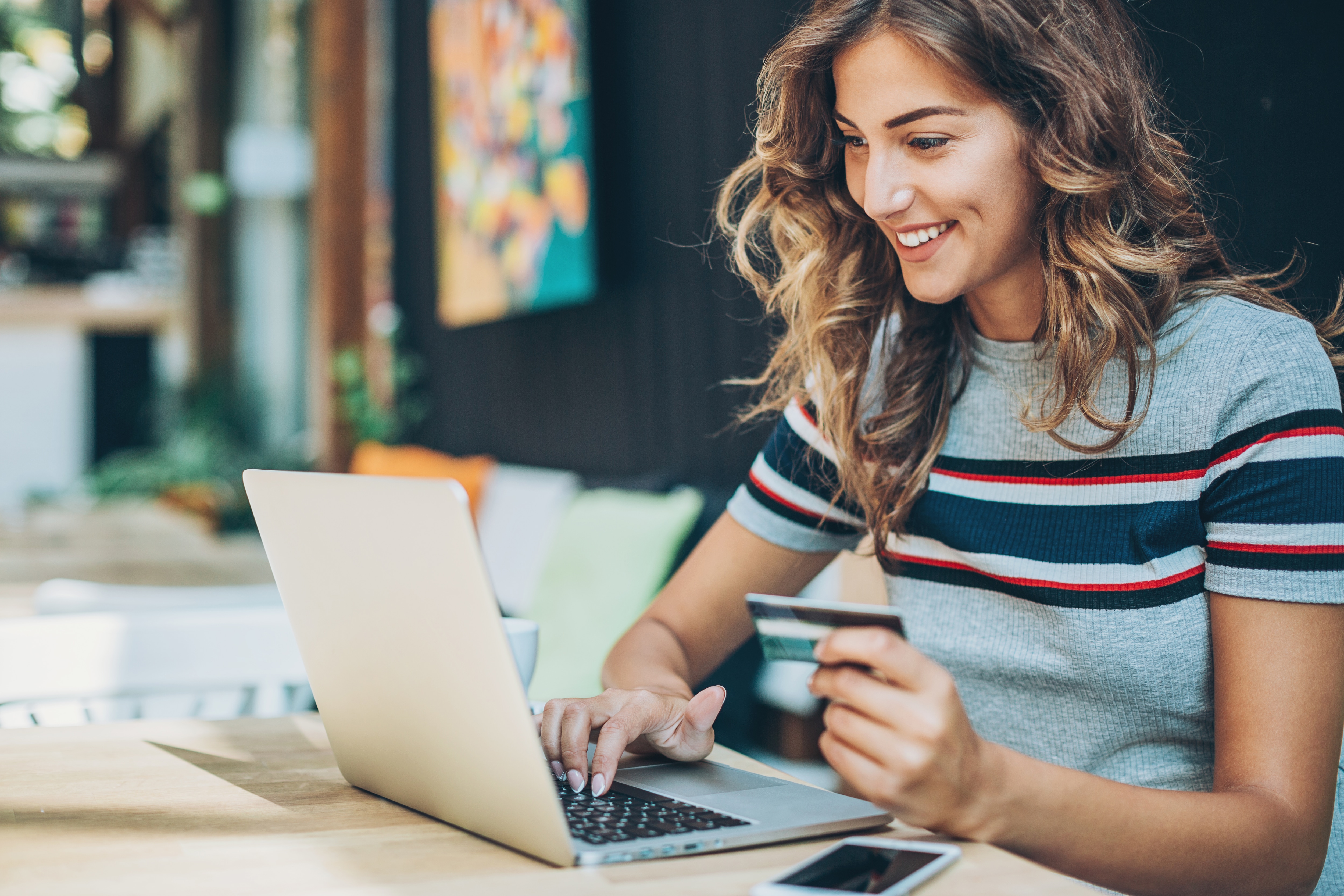 Woman holding credit card